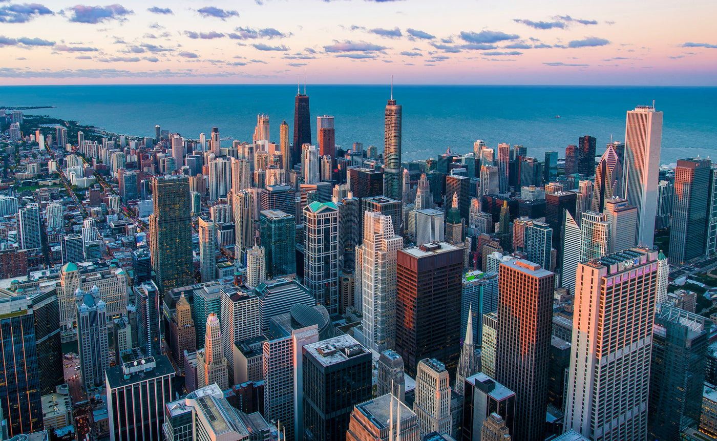Chicago at Blue Hour - Aerial city grid and towers at blue hour. Museum-grade framed artwork by Veriando Studio.