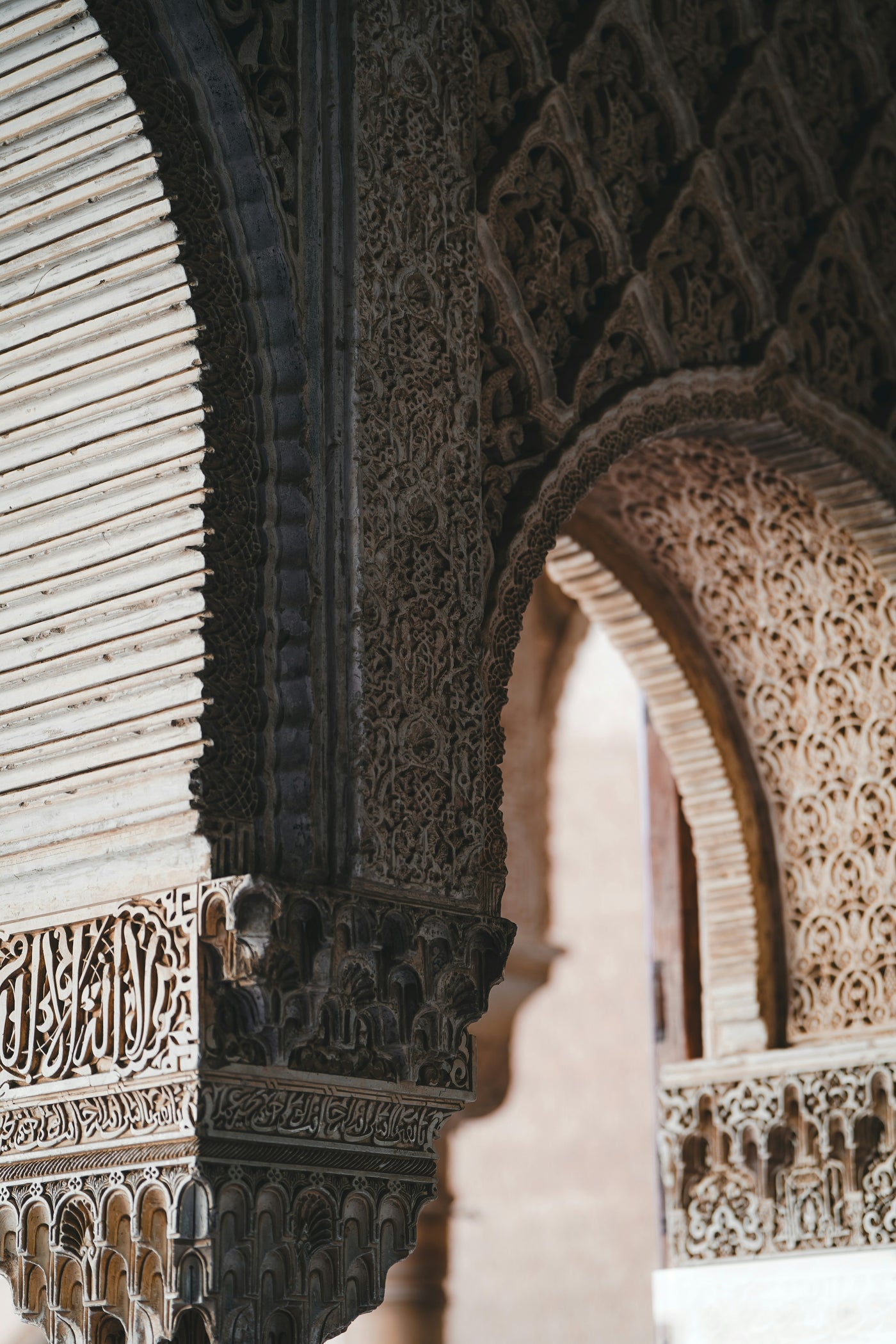 Moorish Arch Detail - Carved arch detail with fine Islamic ornament. Museum-grade framed artwork by Veriando Studio.