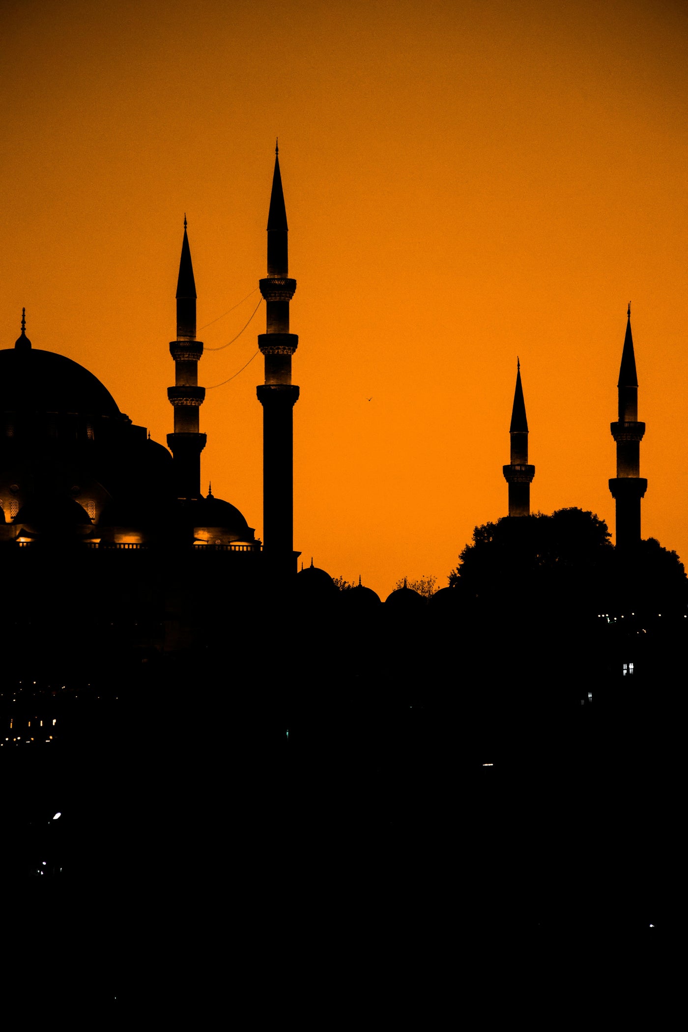 Mosque Silhouette in Saffron - Mosque silhouette against orange sky. Museum-grade framed artwork by Veriando Studio.