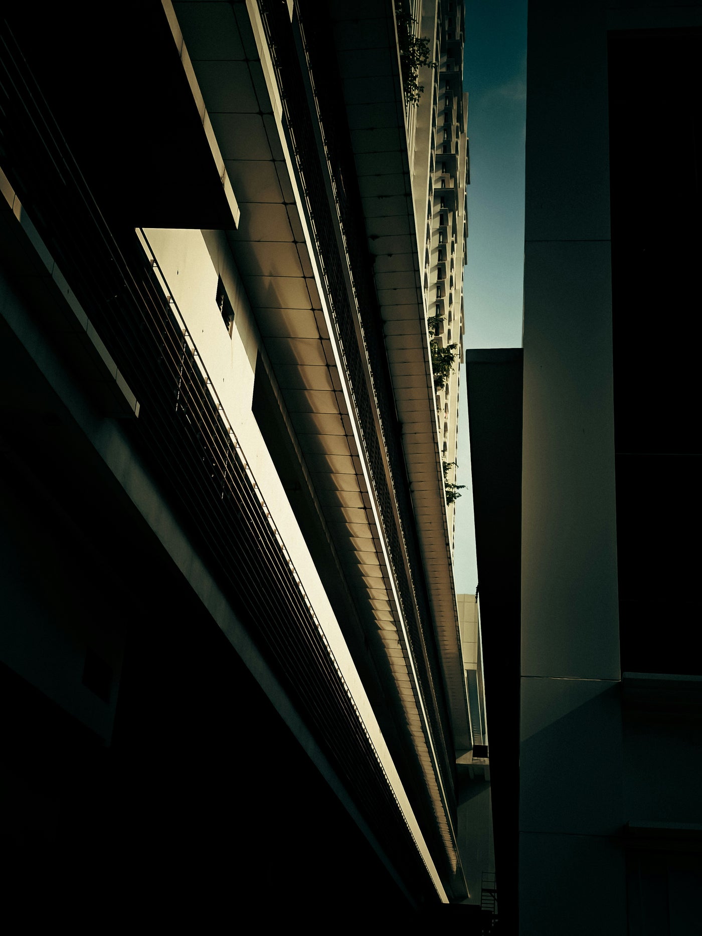 Vertical Shadow Line - Dark vertical architectural line with a strip of light. Museum-grade framed artwork by Veriando Studio.