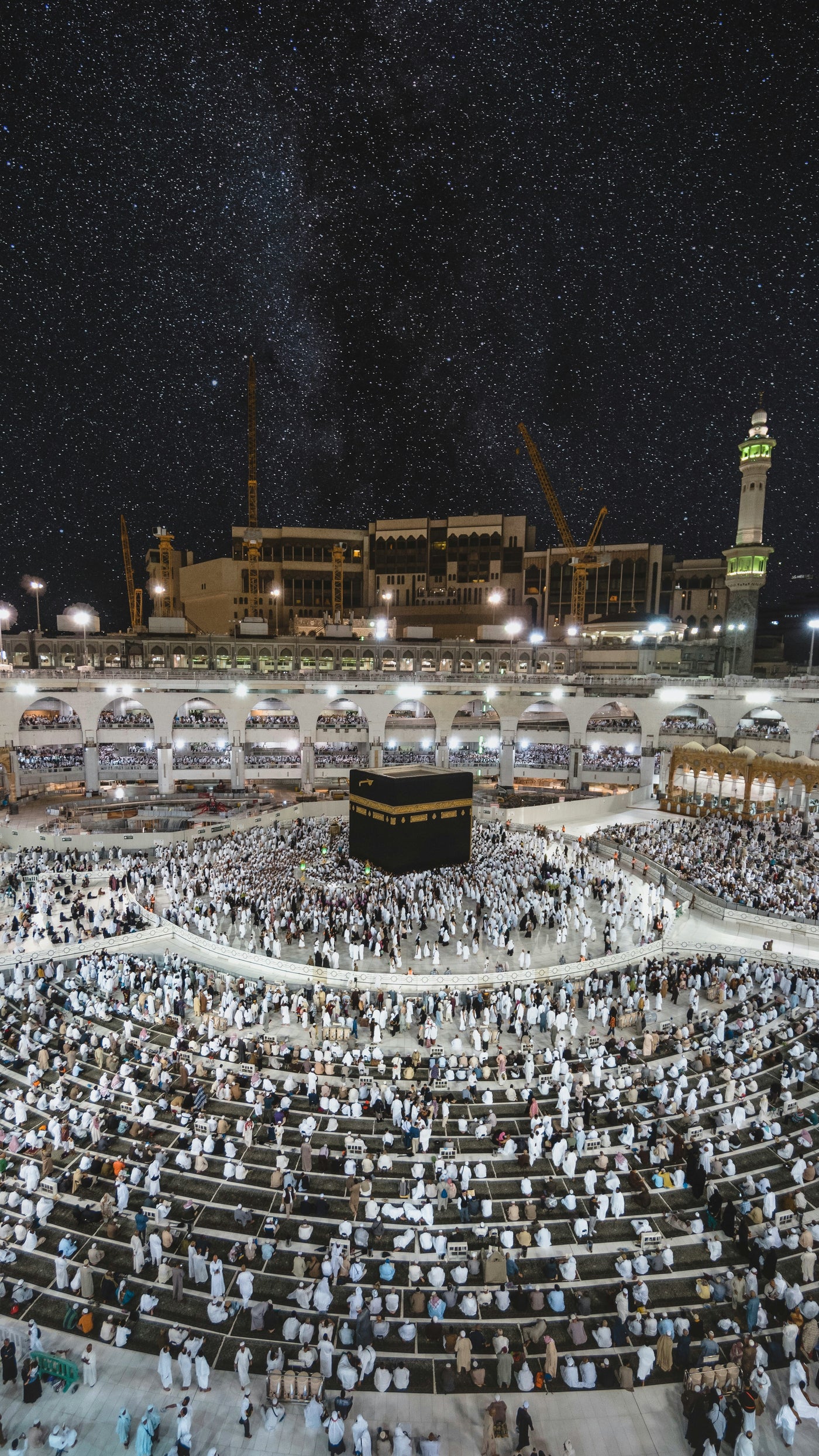Courtyard of Pilgrimage - Kaaba and pilgrims at night. Museum-grade framed artwork by Veriando Studio.