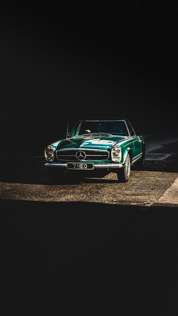 Classic Car in Shadow - Classic car isolated in deep black studio-like light. Museum-grade framed artwork by Veriando Studio.