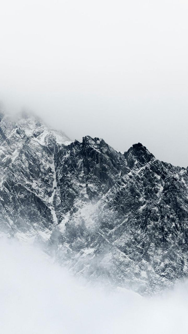 Alpine Mist Line - Snowy mountain ridge disappearing into mist. Museum-grade framed artwork by Veriando Studio.