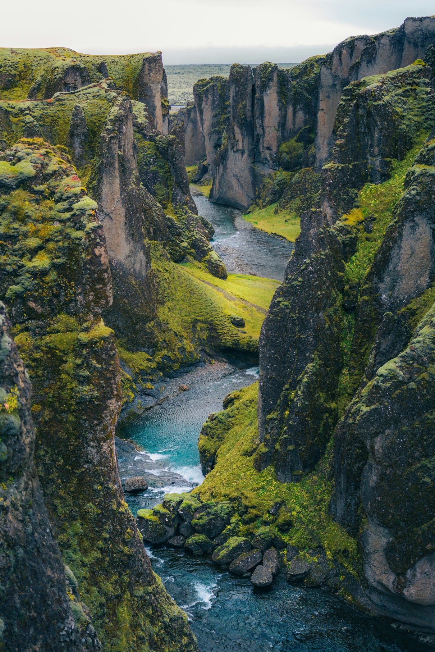 Canyon River View - Deep canyon valley with river and green cliffs. Museum-grade framed artwork by Veriando Studio.