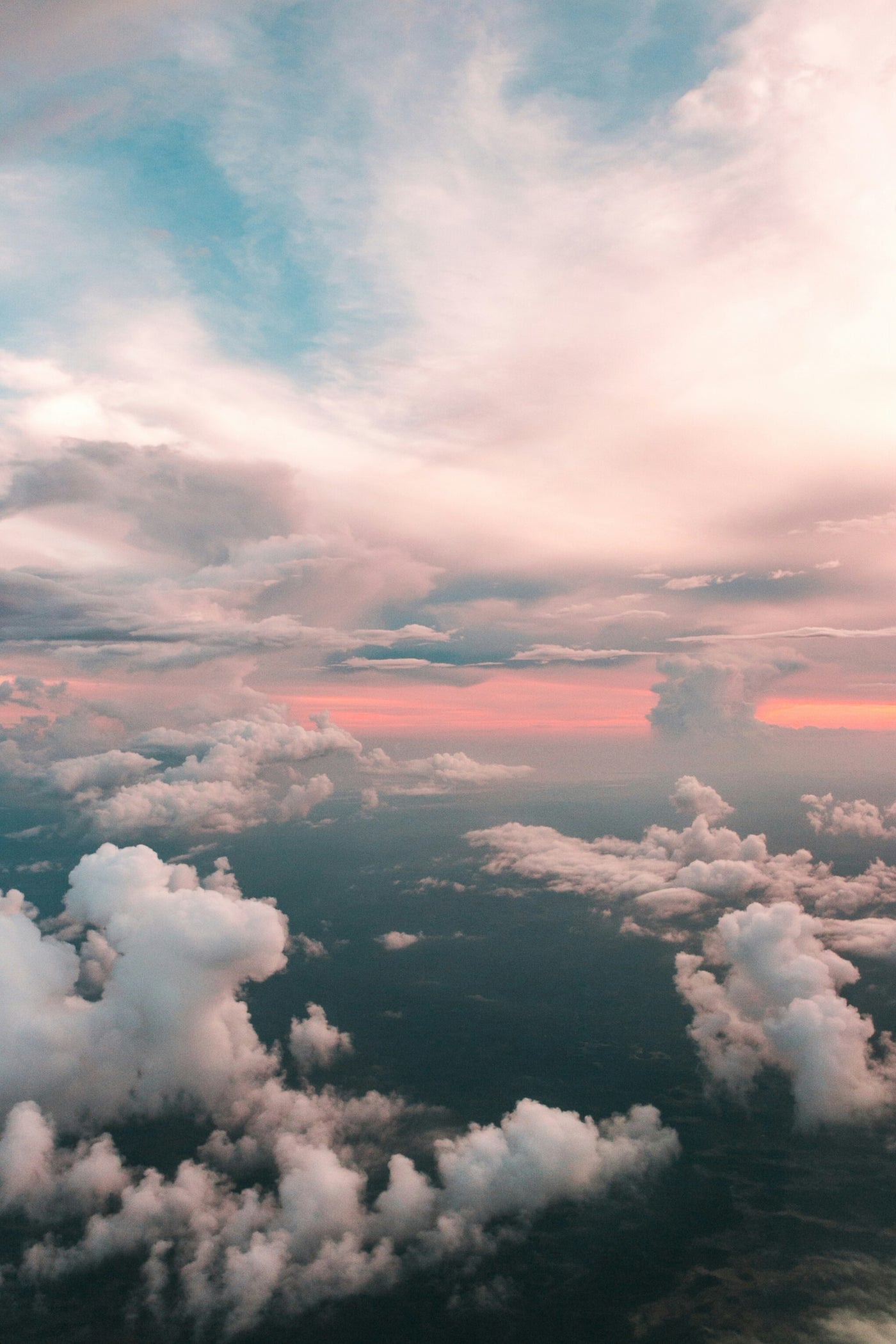 Pastel Clouds Above - Pastel clouds seen from above at sunrise or sunset. Museum-grade framed artwork by Veriando Studio.